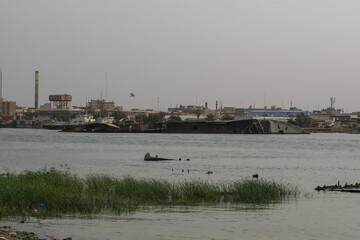Basra, Iraq - April 15, 2022: landscape photo of the tour in river in basra city