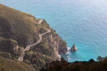 Aerial view from a hiking trail on the coastal driving road of the beautiful scenic Amalfi Coast,...