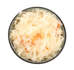 Bowl of tasty sauerkraut with carrot on white background, top view