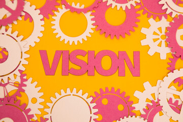 Paper inscription on the background of paper gears