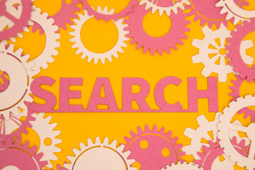 Paper inscription on the background of paper gears