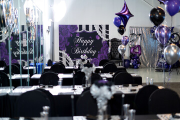 Venue decorated with black and purple decors for a 21st birthday party