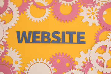 Paper inscription on the background of paper gears