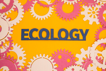 Paper inscription on the background of paper gears