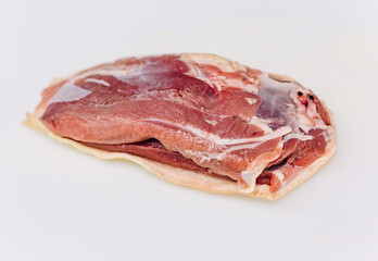 raw pork meat white background close up