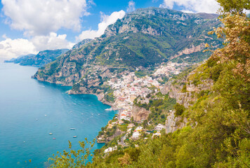 Obraz premium Positano (Campania, Italy) - The touristic sea town in southern Italy, province of Salerno in Amalfi Coast, with colorated historical center and very famous 'Sentiero degli Dei' trekking path.