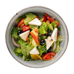Isolated bowl of fresh greek salad on white background
