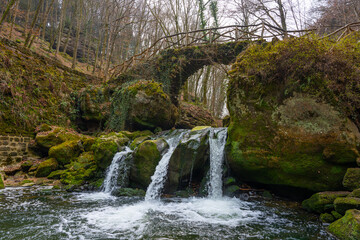 Luxembourg, Waterfall Schiessentumpel in the Zwarte Ernz river