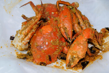 Home food delivery meals during the pandemic. Spicy Kam Heong aka Golden Fragrance and Salted Egg Yolk Mud Crabs. Eaten with deep fried mantou. 