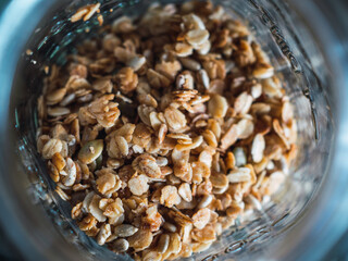 Close-up of homemade oatmeal inside a glass jar top view