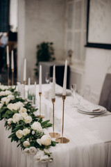 bohemian boho decor with candles on the wedding banquet table