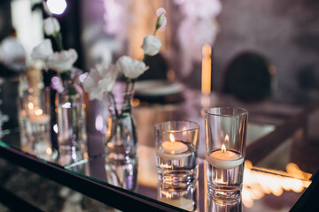 bohemian boho decor with candles on the wedding banquet table