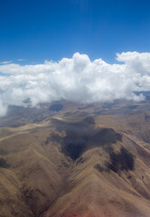 Fototapeta premium Aerial View - Clouds over Andes Mountains in Cusco, Peru