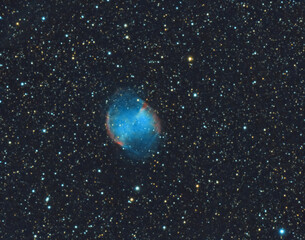 Fototapeta na wymiar The Dumbbell Nebula ( Apple Core Nebula, Messier 27) a planetary nebula in the constellation Vulpecula, taken with an amateur telescope