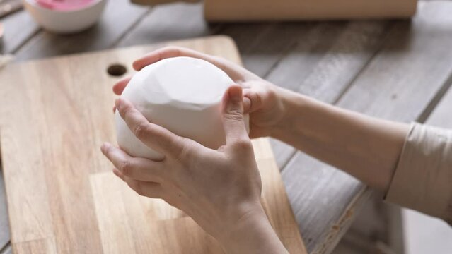 Hands handcraft woman master modeling lamp vase from cold porcelain, girl sculpts from porcelain clay, hobby for the soul scandinavian and boho style interior decor