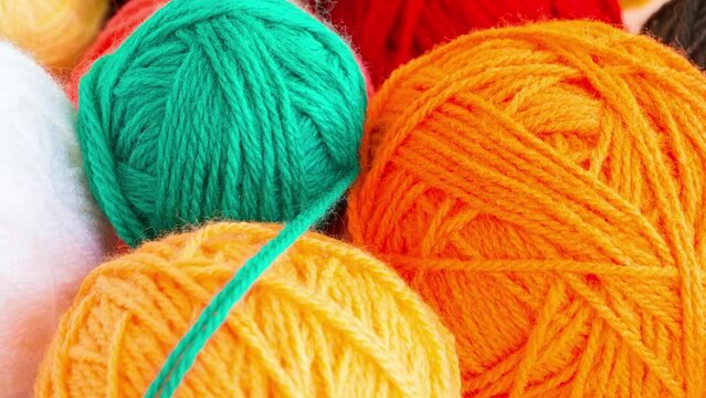 The photo shows the knitting needles with a ball