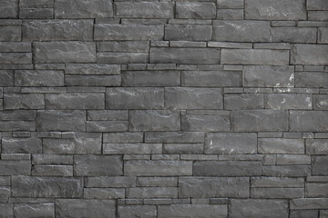 old masonry black stone wall