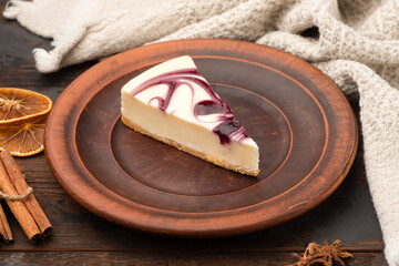 Cheesecake, cheesecake cheese dessert, on a wooden background.