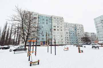 playground with slides in the yard in winter