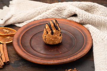 Dessert, dessert with condensed milk, on a wooden background.