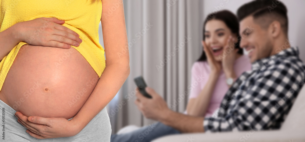 Canvas Prints Surrogacy concept. Young pregnant woman and blurred view of happy couple indoors, banner design