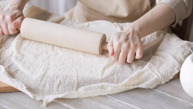 Handcraft woman master modeling cold porcelain, hands with rolling pin, creative workshop, Girl sculpts from porcelain, hobby for the soul scandinavian and boho style interior decor