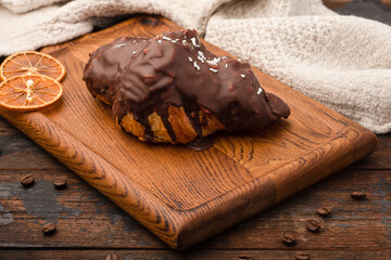 Croissant, croissant with different fillings, wooden background