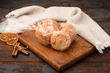 Cookies, gift-wrapped cookies, delicious gift, wooden background