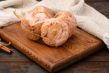 Cookies, gift-wrapped cookies, delicious gift, wooden background