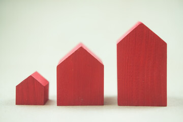 A row of red house model like a graph