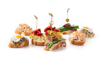 Assortment of Spanish pintxos isolated on white background