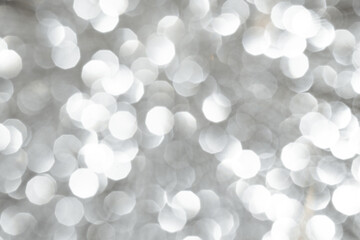Silver sparkle background with beautiful bokeh