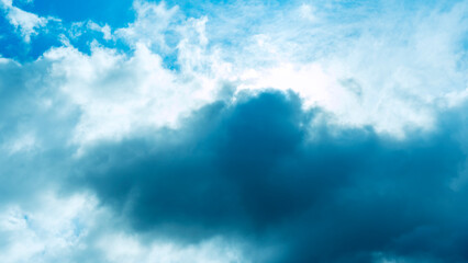 Fototapeta premium Rain cloud and sun beam. Panorama of cloudy gray sky. Abstract textured. Rain clouds background. Space for text.
