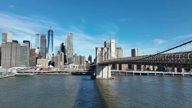 Manhattan skyline behind Brooklyn Bridge New York City