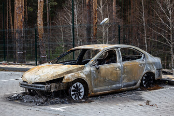 Hostomel, Kyev region Ukraine - 09.04.2022: Cities of Ukraine after the Russian occupation. Cars...