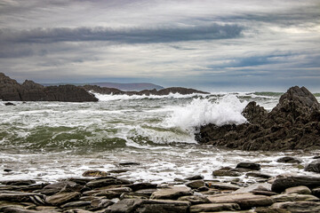 A storming November day on a North Devon beach, with waves crashing against the rocks.