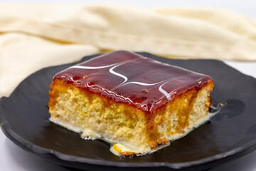 Trilece dessert with caramel on a white background. World cuisine desserts. close up