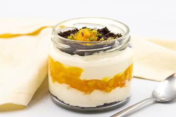 Orange magnolia dessert on a white background. World cuisine desserts. close up