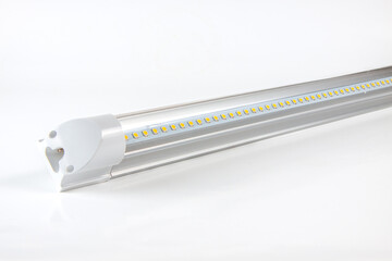 Close-up of LED fluorescent light tubes with white background