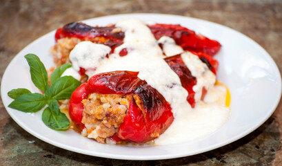 Stuffed peppers with dairy construction. A traditional dish in the Bulgarian national cuisine, which is prepared with red or green peppers, minced meat, rice and spices.