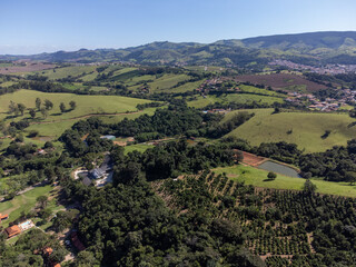 fields with plantations in small mountains in a city in the interior - Socorro, São Paulo, Brazil