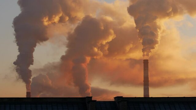 Smoking chimneys footage. Environmental pollution, carbon dioxide emissions, global warming.