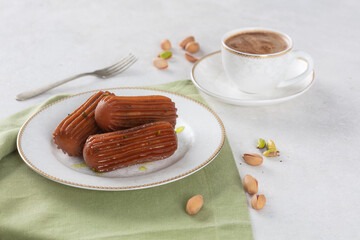 Tulumba Dessert served with Turkish coffee