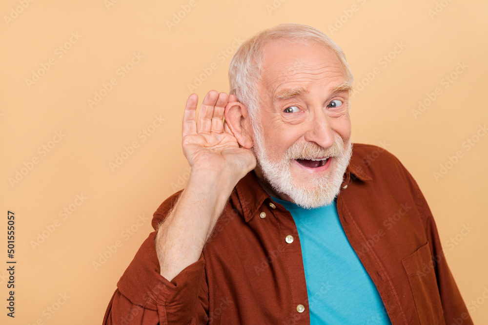 Sticker Photo of funny aged white hairdo man listen wear outfit isolated on beige color background