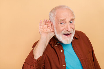 Photo of funny aged white hairdo man listen wear outfit isolated on beige color background