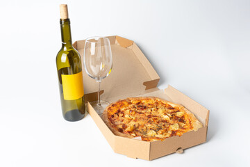 Italian pizza and a bottle of white wine
