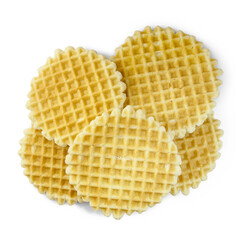 Pile of round waffles isolated on white background, top view. Thin golden waffled cookie.