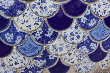 blue and white flowers type tiles close-up background and texture