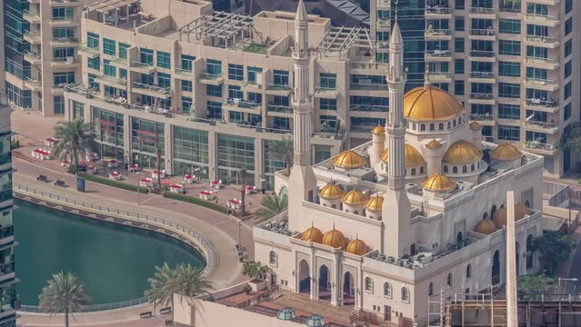Aerial view of the small mosque of Dubai Marina at morning timelapse