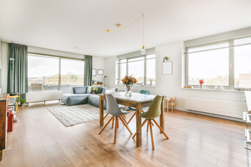 Spacious living room with served table